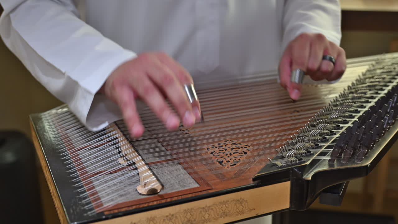 The qanun’s shimmering tones fill the air as an Arab artist brings centuries-old music to life