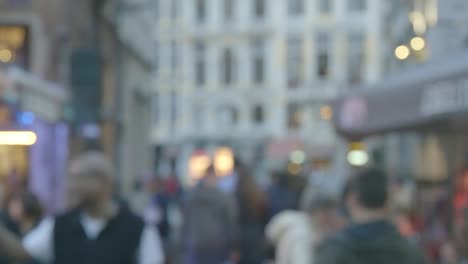 blurry crowd in brussels at dusk