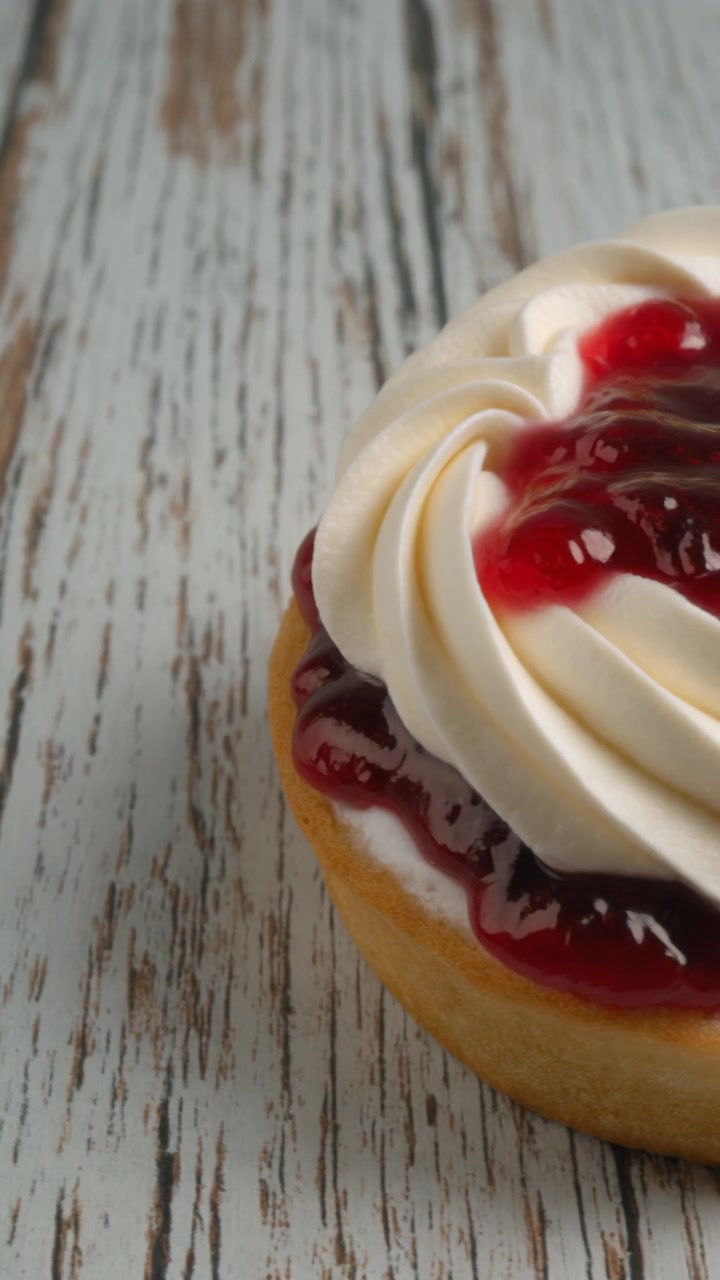Close-up of a Delicious Cream and Berry Jam Tart