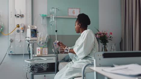 Woman,-smile-and-card-in-bed-of-hospital