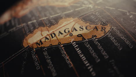 close-up of madagascar on a vintage world globe map