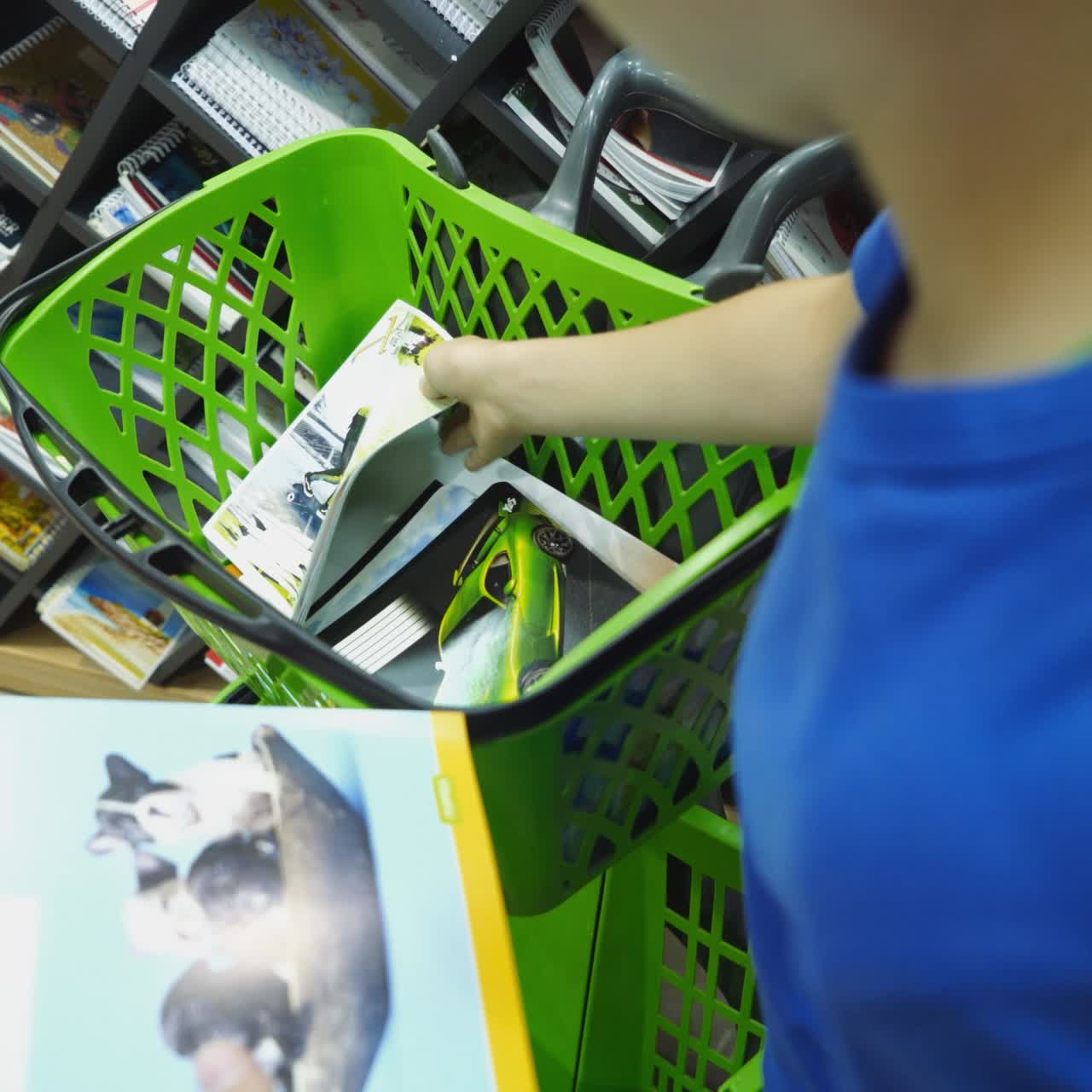 VINNITSA, UKRAINE - AUGUST 20, 2018: Back to school concept. Purchase of stationery in the store. Close-up.