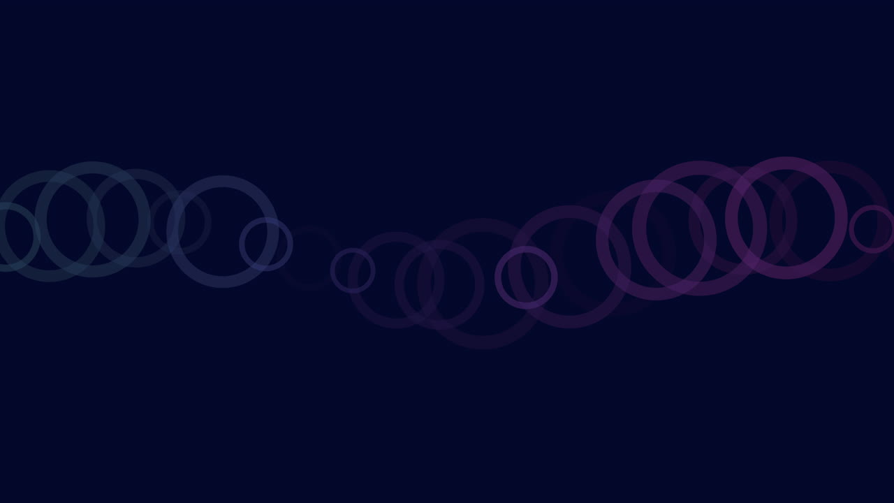 Spiral arrangement of circles against a dark backdrop