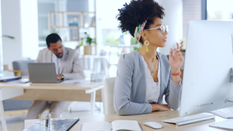 Typing,-thinking-and-computer-with-woman-in-office