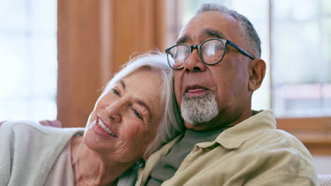 Talking,-watching-tv-and-senior-couple-in-home