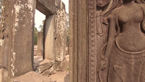 the details sculptural figures and ancient prints carved on stone walls in bayon temple, angkor thom