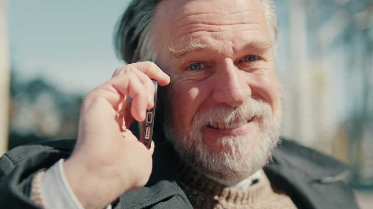 Happy Old Man on Phone in the City