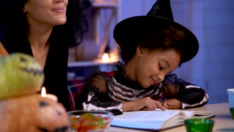 mother and daughter celebrating halloween