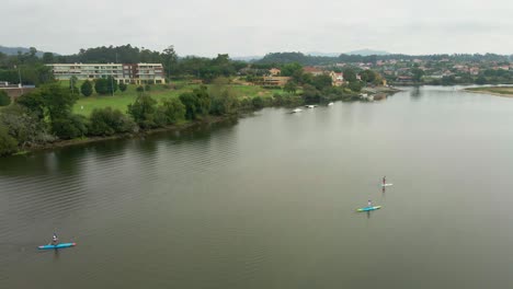 Paddlers-Enjoying-the-Scenic-Beauty-of-the-Cávado-River,-Esposende,-Portugal