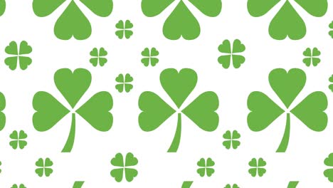 animation of multiple clover leaves moving in formation on white background