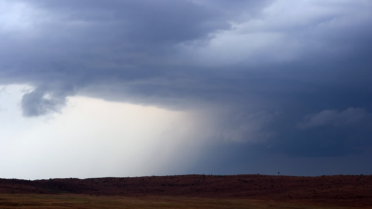 Dramatic Storm Clouds Over a Flat Landscape