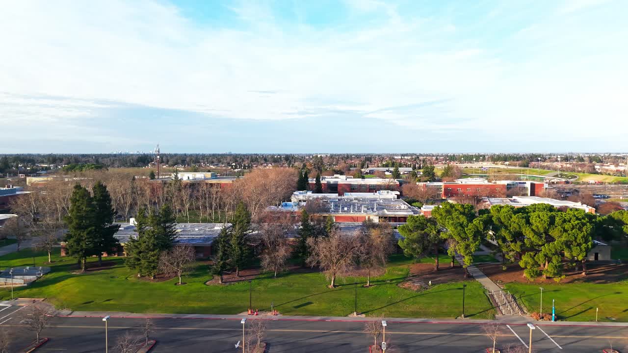 Drone footage of Cosumnes River College campus in Sacramento filmed in late afternoon light