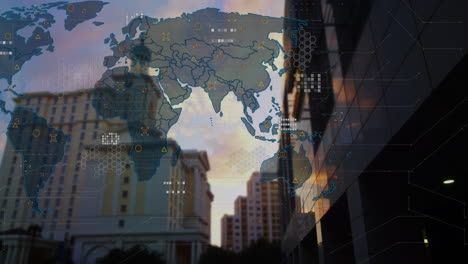 World map with data processing animation over cityscape at sunset