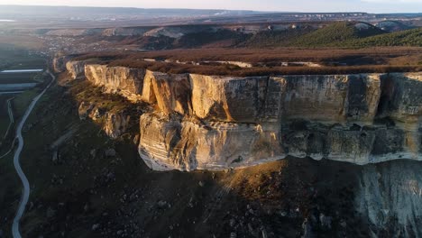 aerial view of dramatic cliffs and valley