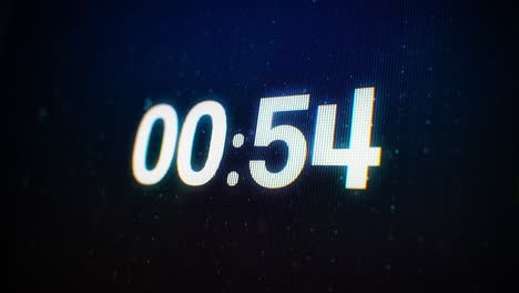 Close-up of 60 Seconds Glitch interference countdown numbers on a Computer Screen in Defocus. 1 minute countdown. 30 or 10 seconds. White digits on a Black Background