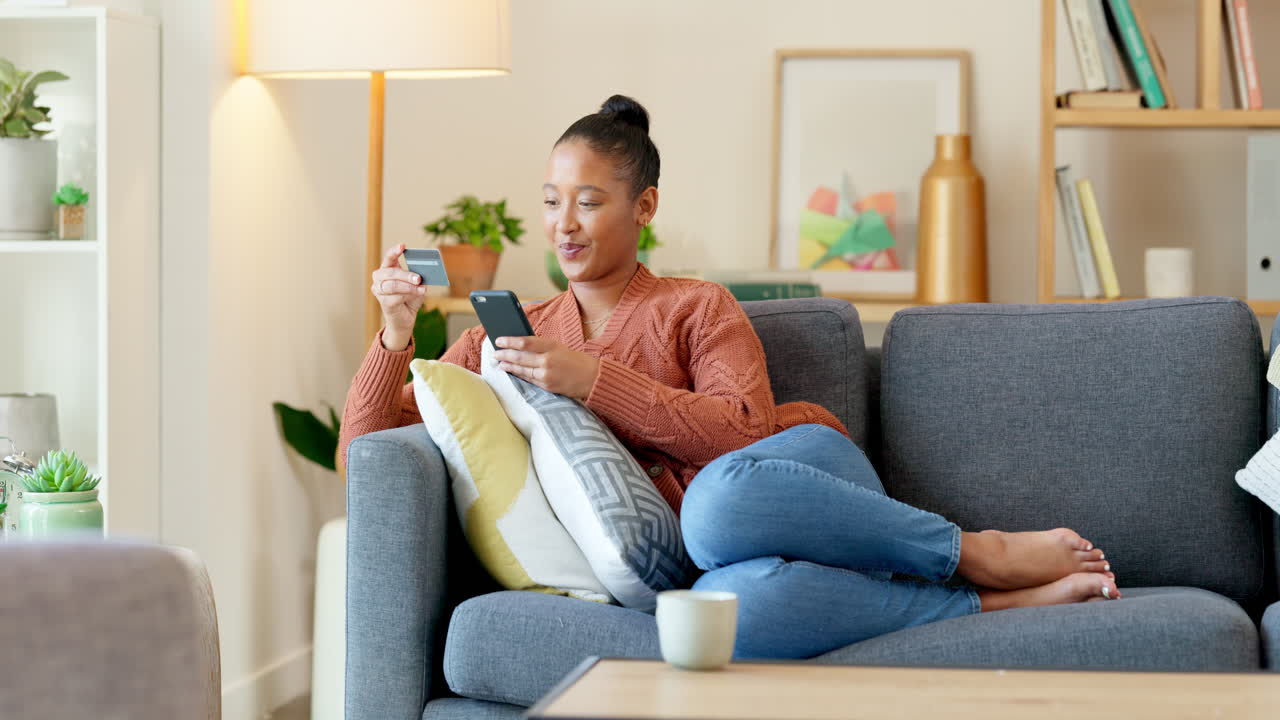 Woman online shopping with a phone and