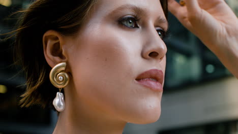 Close-up-view-of-elegant-woman-with-earrings