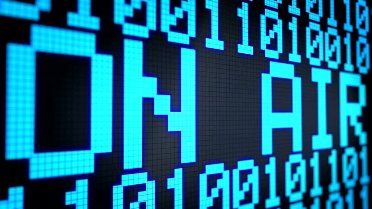 Looped animated background with running lines with binary code and shimmering text "on air" light-blue color on the black screen. Pixels. 4k. Seamless loop.