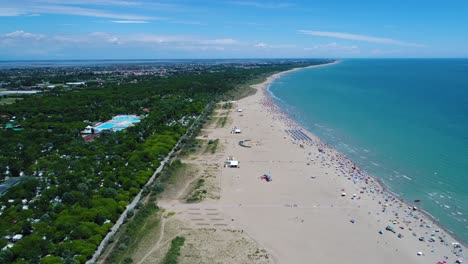 italy, the beach of the adriatic sea. rest on the sea near venice. aerial fpv drone flights.