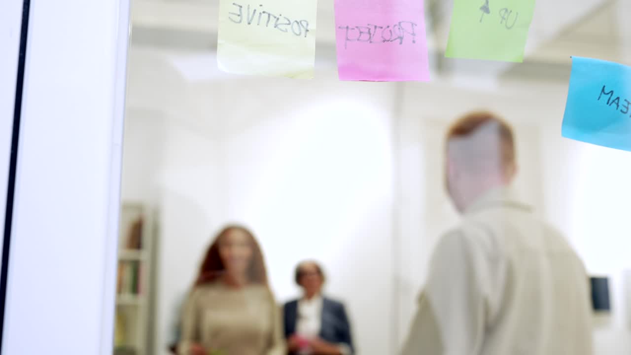Brainstorming session in the office with sticky notes