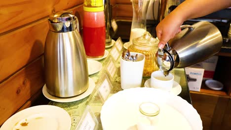 tea being poured into a cup in hanoi