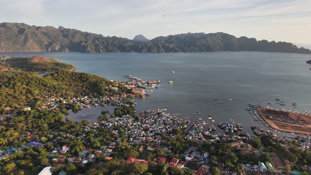 Drone footage of Coron Town, housing by the water, Philippines