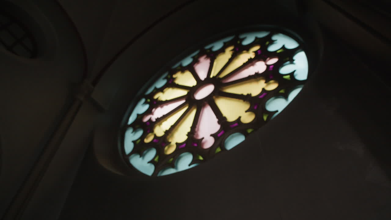 Stained Glass and Man in Church