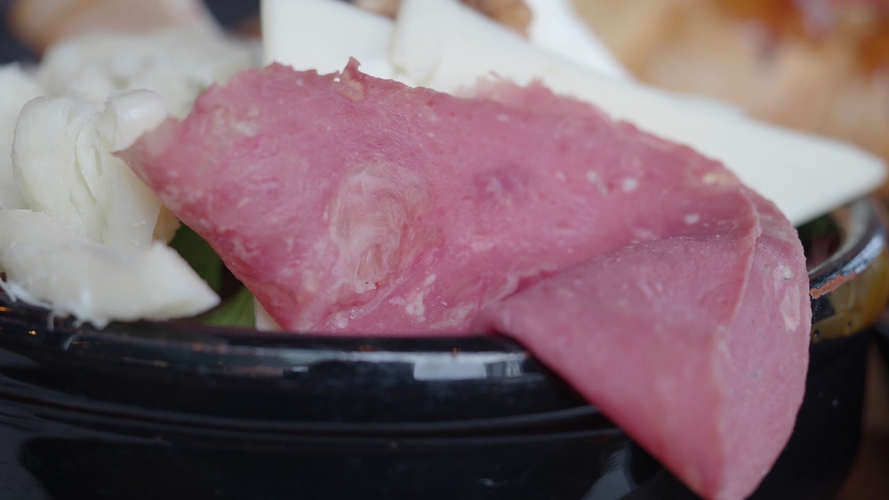 Close-up of Salami and Cheese on a Breakfast Plate