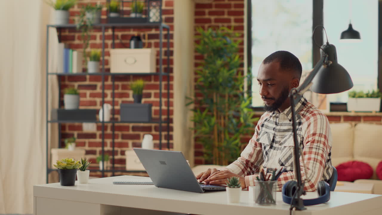 Office manager working from home with laptop