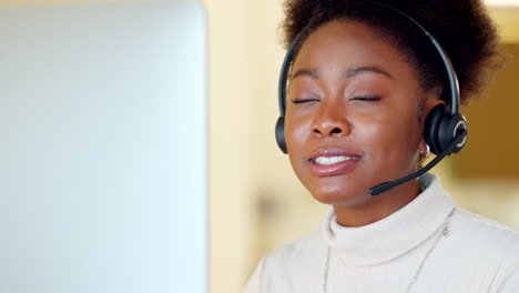 Black-call-center-agent-wearing-a-headset