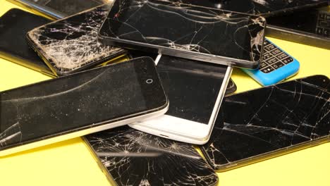 many broken smartphones in a repair shop broken sm 4k 2025 08 05 00 30 34 utc.mov | asian, assembly, background, board