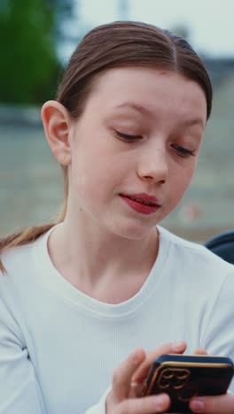 girl looking at a smartphone