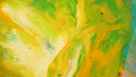 abstract fluid art with yellow and green