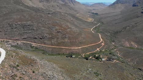 4x4-pickup-truck-driving-on-dirt-roads-on-mountain-passes-in-the-Cederberg-with-some-scenic-views-and-landscape