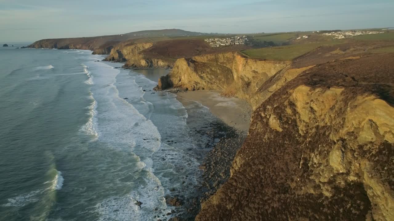 Sunset aerial overlooking the beach at Porthtowan Cornwall England UK