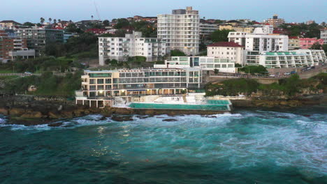 bondi icebergs drone shot with early morning swimmers doing laps