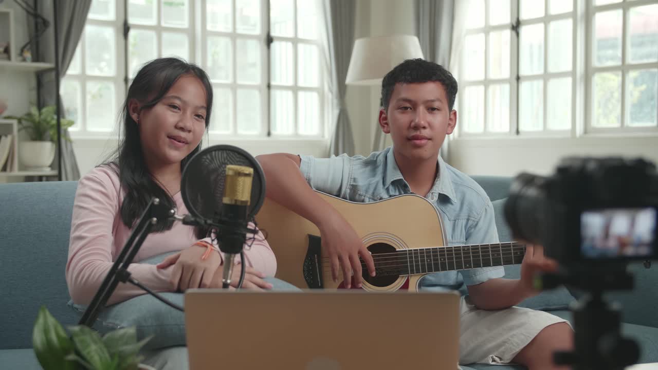 Kids Singing and Playing Guitar Together