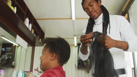 african man preparing the wig