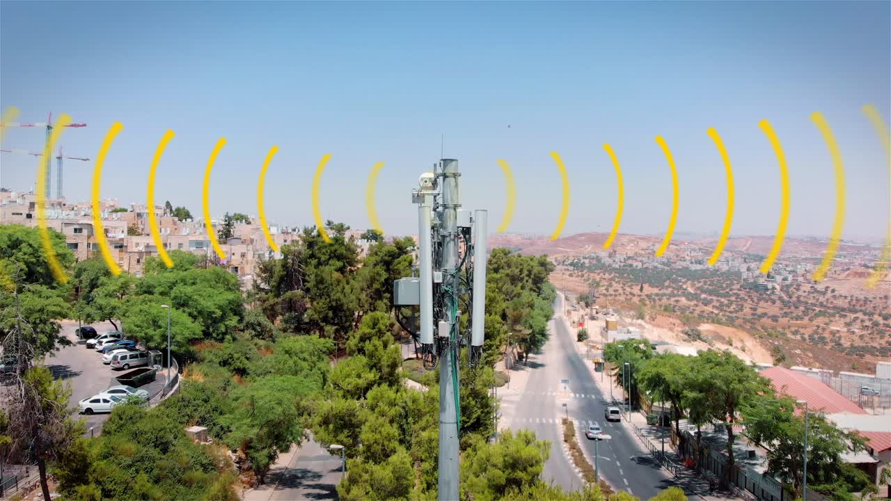 Cell Tower and Wireless Signals in Urban Setting