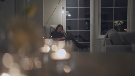 grief-stricken woman cries in living room, slide reveal