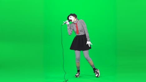 mime singing song in microphone, dancing. chroma key. full length