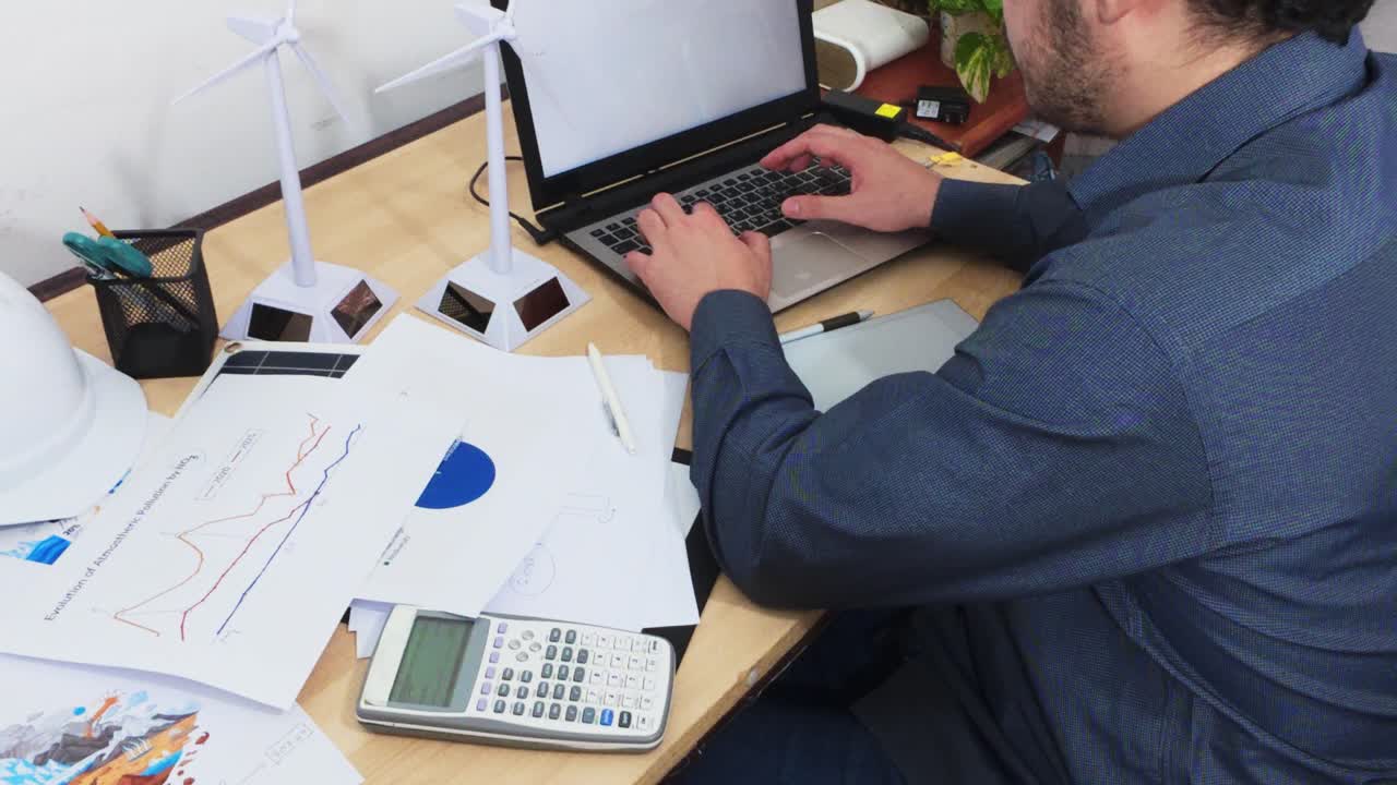 Engineer Typing Quickly on a Laptop Keyboard