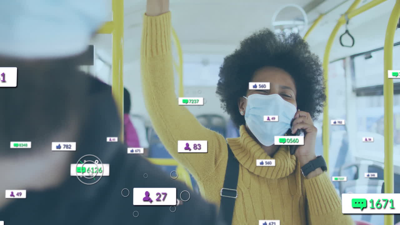 Wearing mask on bus, person viewing animation of social media notifications