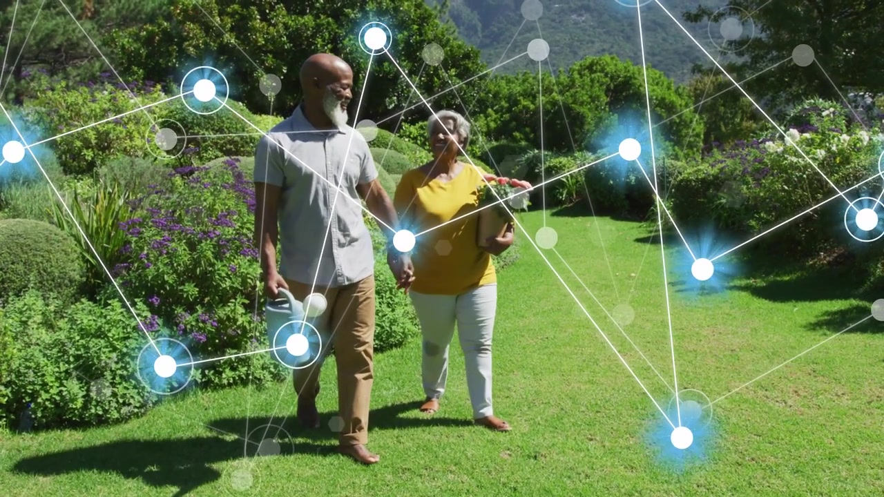 Coppia che cammina trasportando una pianta e un annaffiatoio, con una sovrapposizione di nodi temporizzati che si estende sulla coppia, mostrando tecnologia