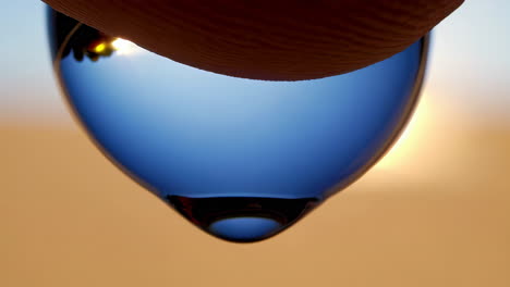 water drop reflection at sunset