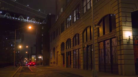 Establishing-shot-of-warehouses-under-the-Brooklyn-Bridge-with-subway-train-crossing-3