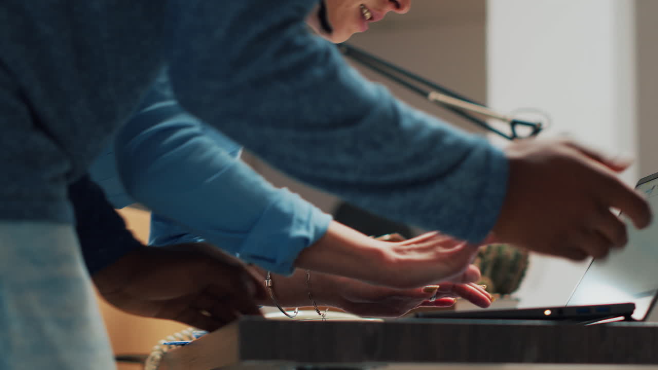 Working on a laptop in the office