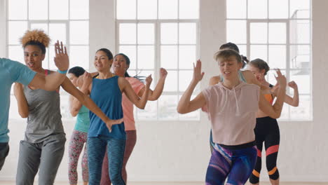 dance class happy group of multi ethnic people dancing enjoying training workout practicing choreography moves in fitness studio