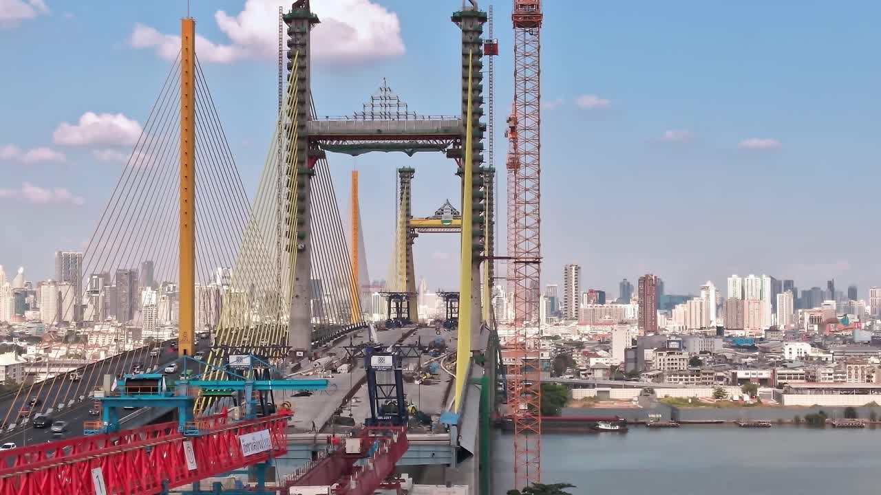Construction of a bridge over water in Bangkok as seen from above