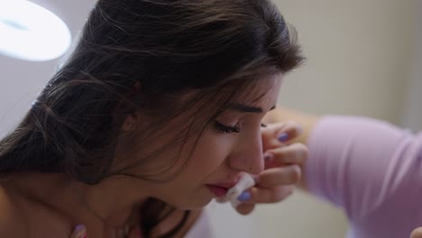 woman crying and being comforted